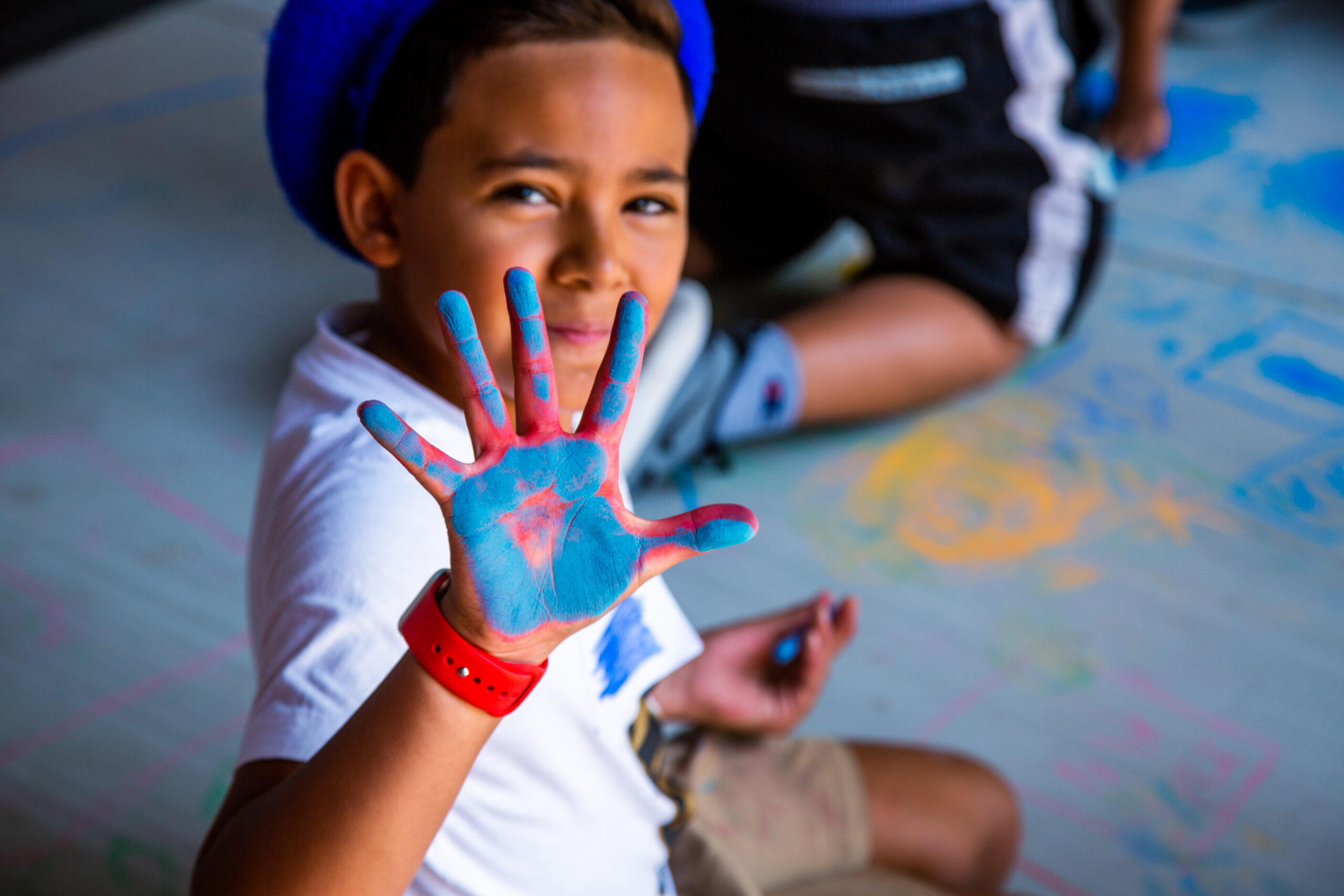 Child enjoying the Art All Summer day camp.